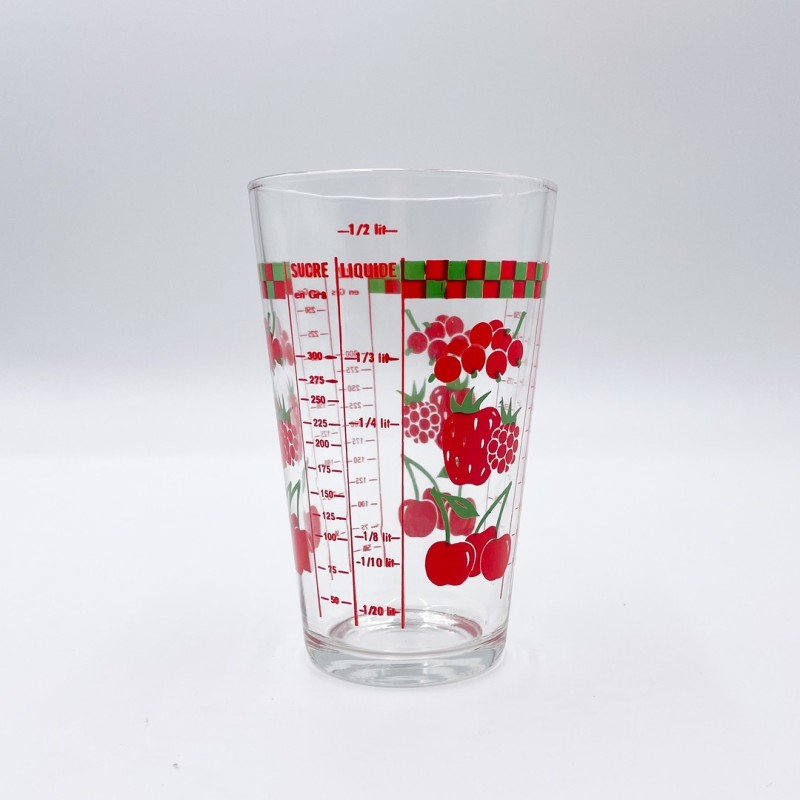 Verre doseur motif fruits, années 70