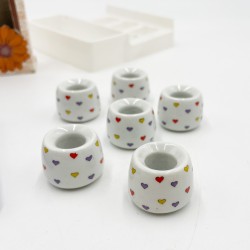 Ensemble de 6 mini bougeoirs motifs coeurs, années 80