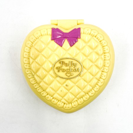 Polly Pocket "Bébé qui se promène", boitier coeur jaune matelassé